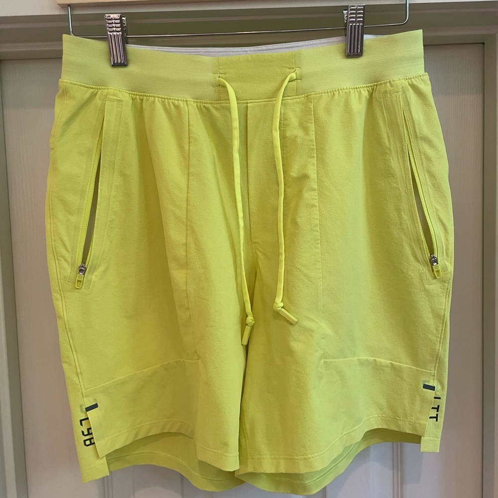 Bright yellow Lululemon license to train shorts. Size medium, 7” inseam